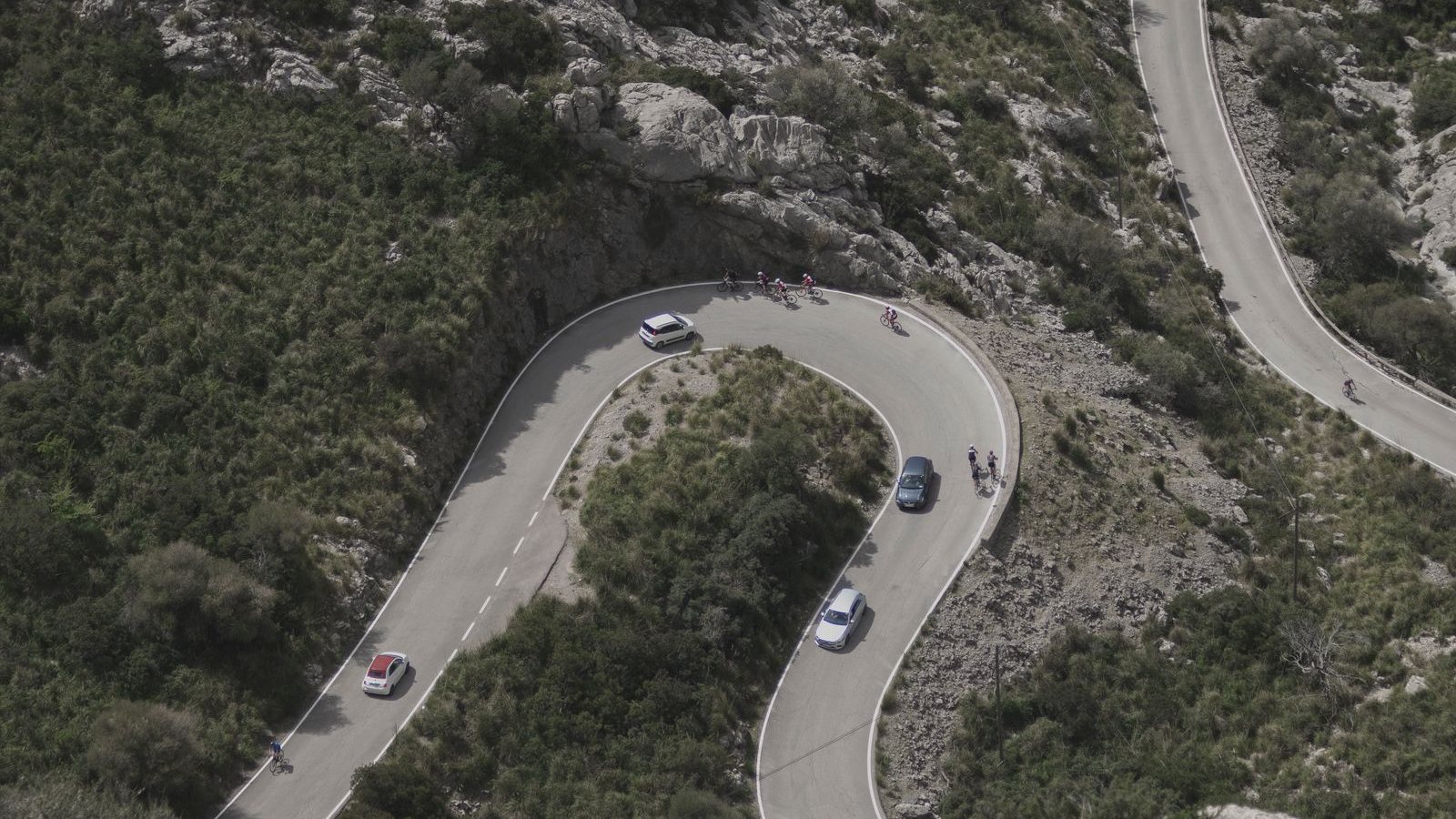 Winding mountain road through rocky terrain — Khor Fakkan Road R1000C